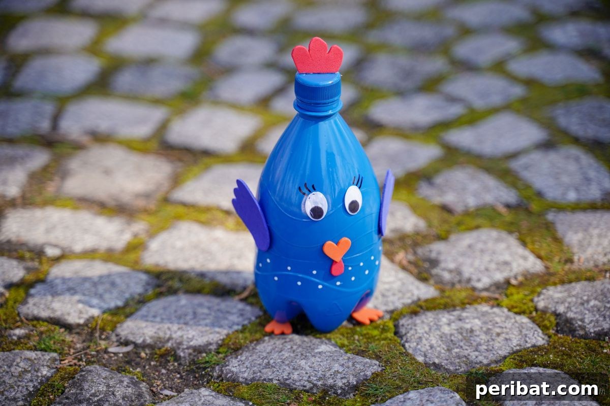Blue plastic bottle turkey craft resting on natural rocks, with soft lighting.