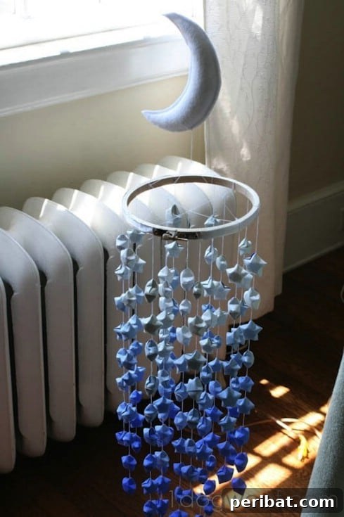 Irresistible DIY Baby Crafts for Your Bundle of Joy 25 Lucky Star Ombre Mobile for Nursery