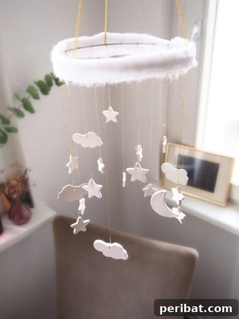 Irresistible DIY Baby Crafts for Your Bundle of Joy 26 DIY Cloud-star-moon-mobile