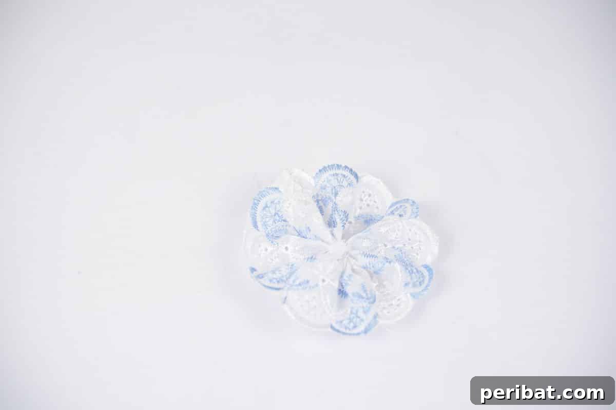 Denim Delight: Simple Wreath from Upcycled Jeans 5 blue and white circle lace bow on white table