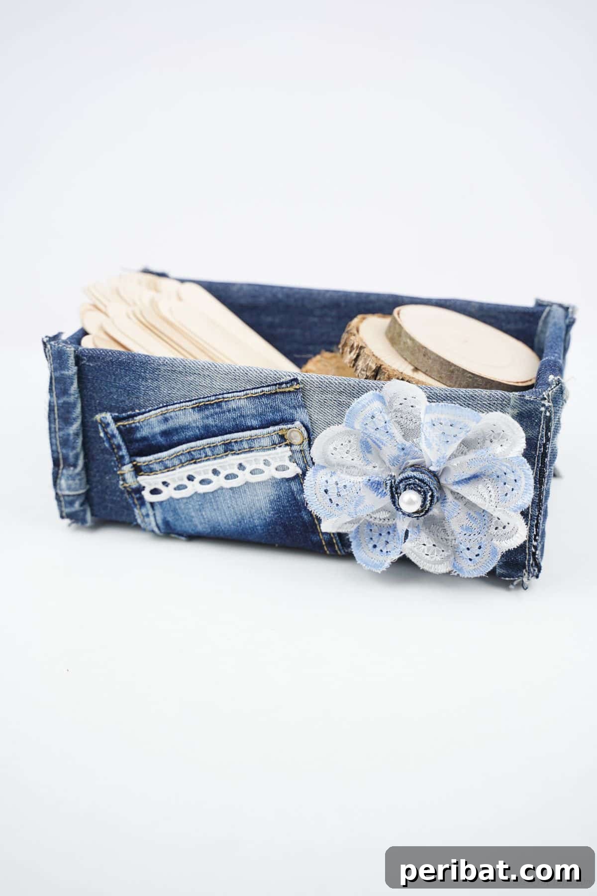 Upcycled Denim Storage Box 10 denim box on table that is filled with craft sticks