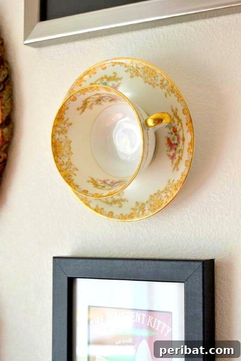 Beyond the Brew: 25 Beautiful Ways to Repurpose Old Teacups 16 Hanging Teacup Wall Decor
