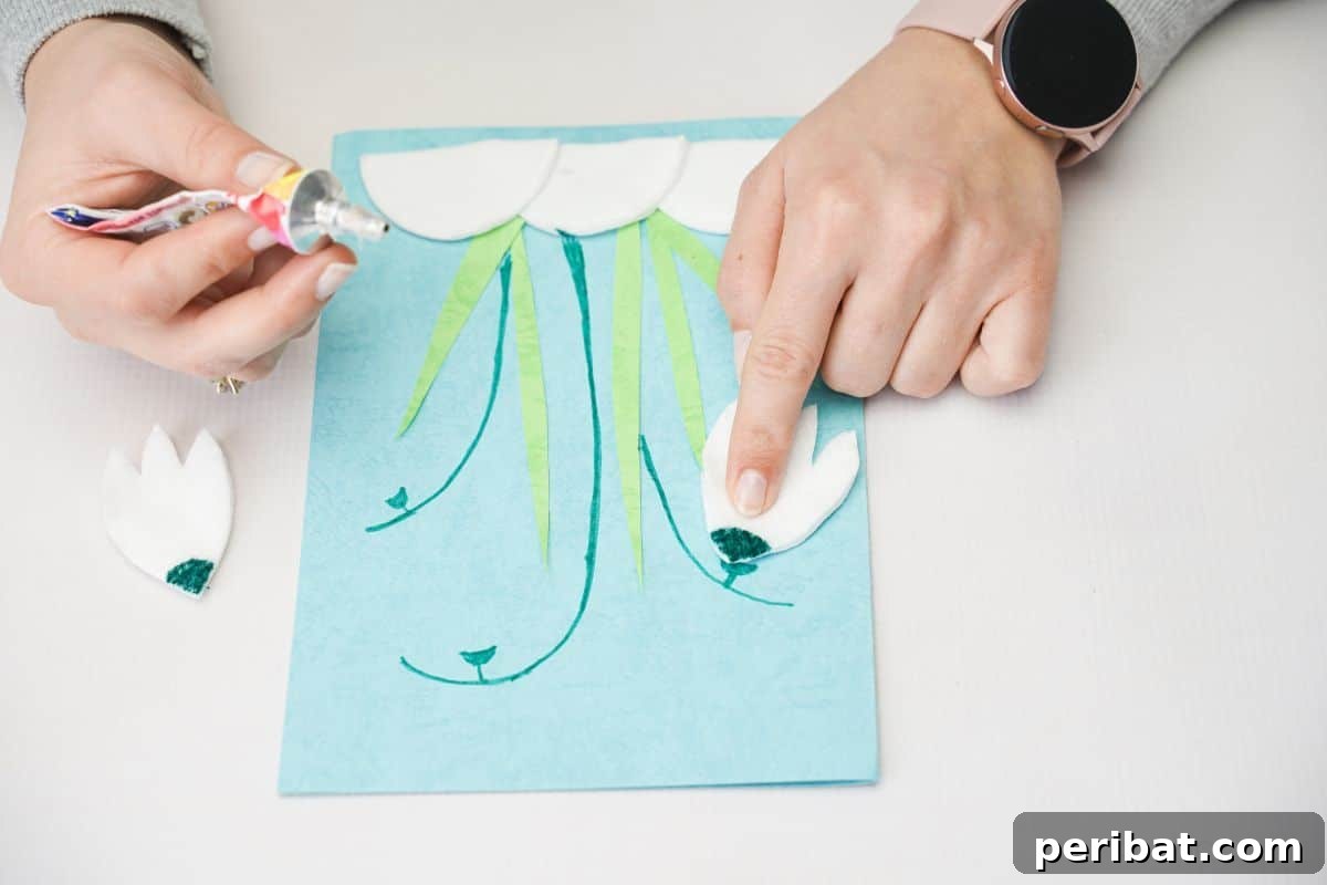 Exquisite Handcrafted Paper Tulip Greeting 9 hand gluing tulip shapes onto blue card