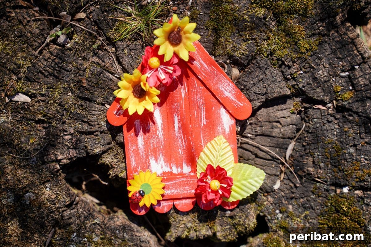 DIY Popsicle Stick Farmhouse Decor 7 tree stump under orange craft stick house