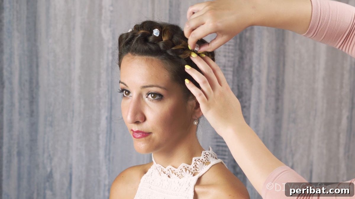 Whimsical French Crown Braid 14 mini white flowers being tucked into braid