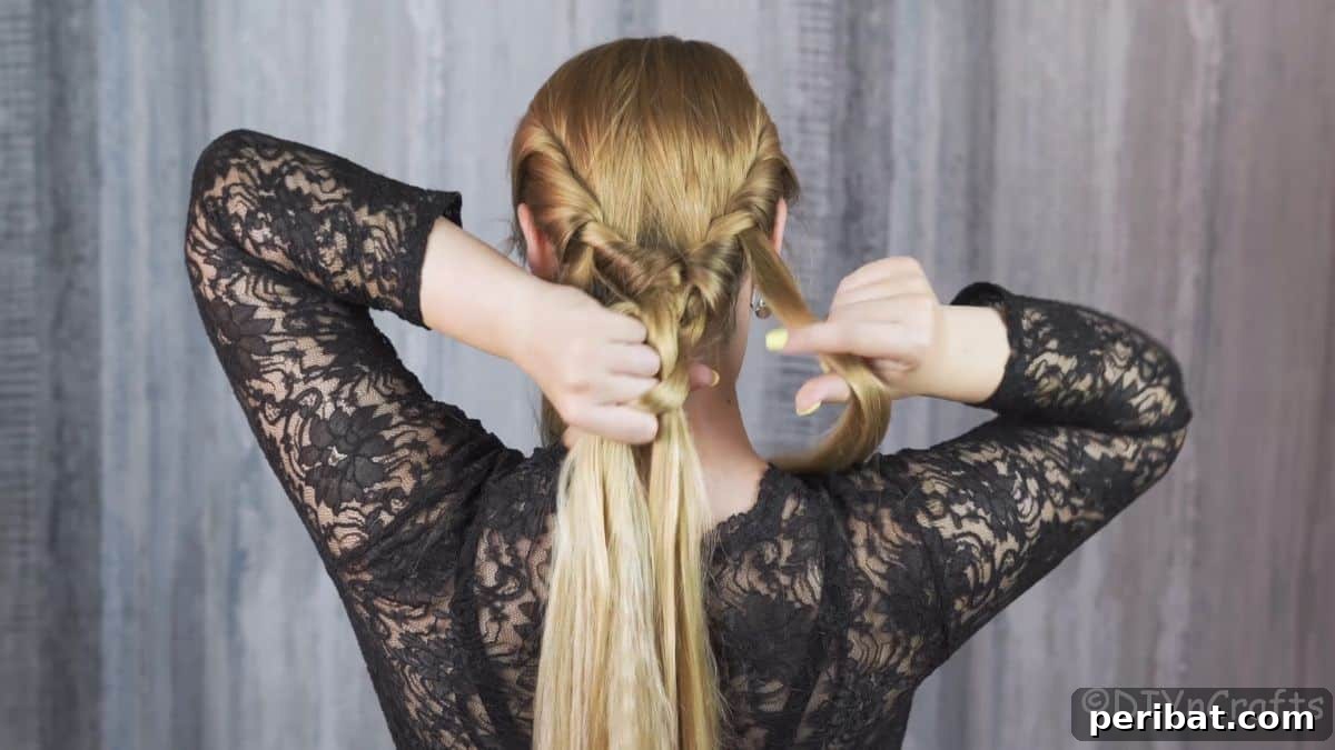 Artfully Twisted Low Braided Ponytail 11 Beginning the French braid by incorporating side sections