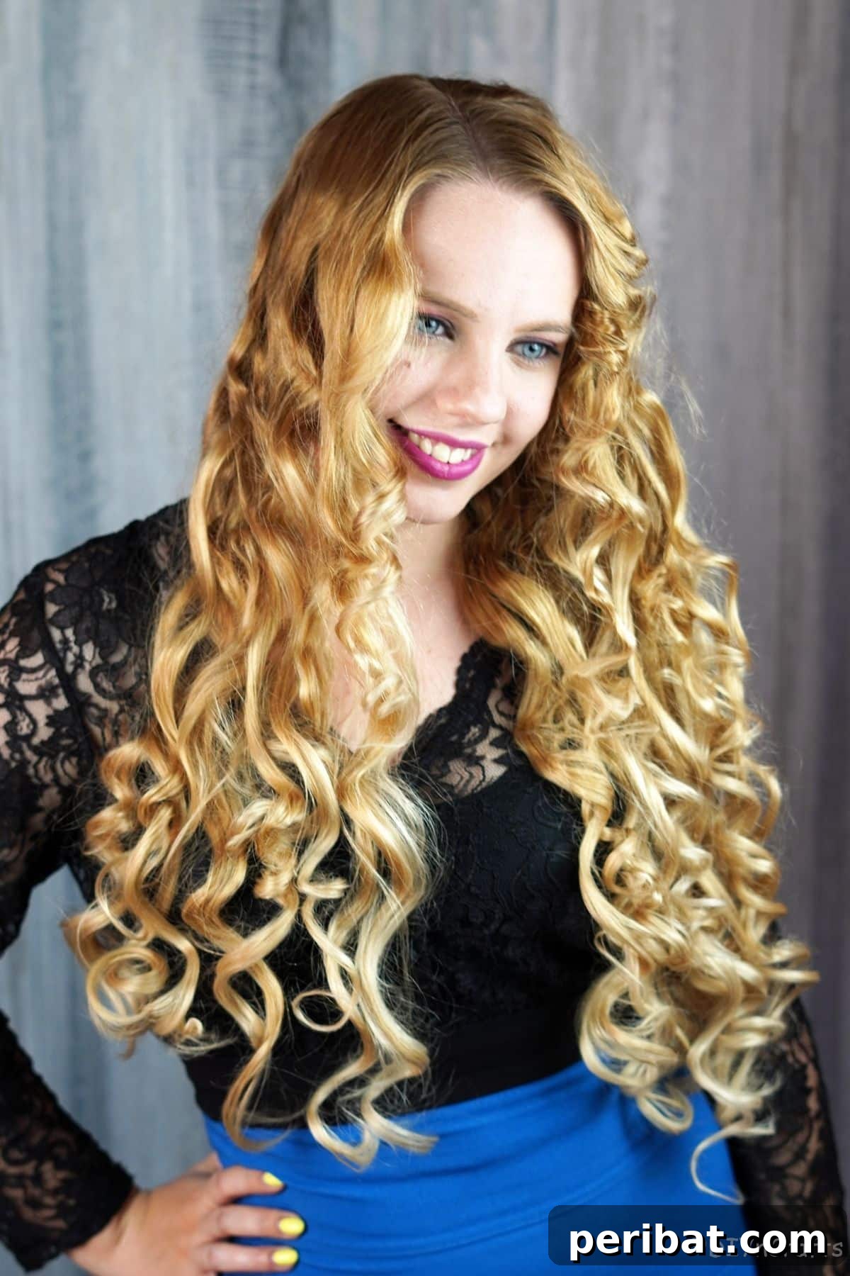 Aluminum Foil Curls Made Easy 8 A stunning final shot of a woman with her blonde hair beautifully styled into voluminous and defined curls, showcasing the successful outcome of the aluminum foil curling method.