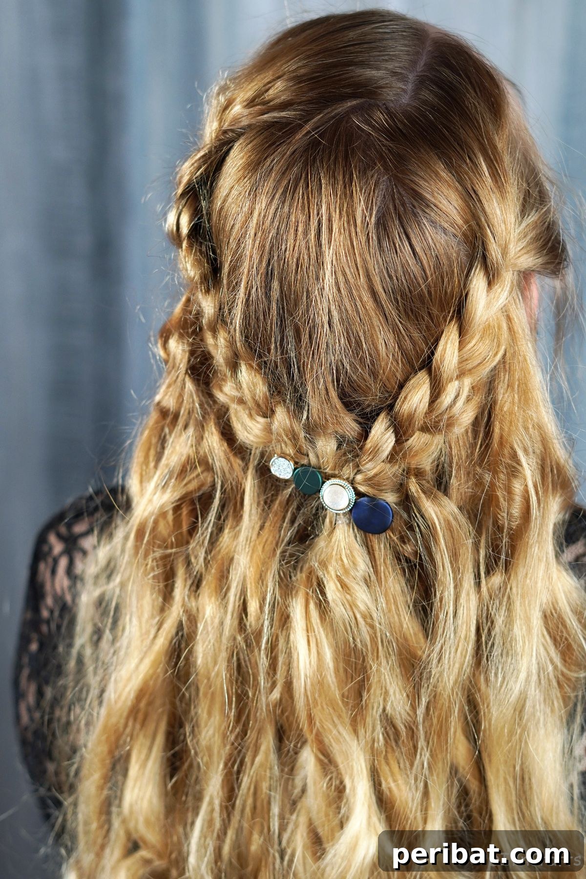 Chic Braided Halo Half-Up 20 back of blonde hair with braids and decorative pin on half up hairstyle