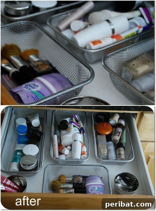 Neatly organized makeup drawer with various sized dividers and containers