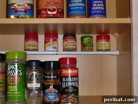 Cabinet Organizer using a Tension Rod