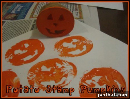 Creative potato pumpkin stamps with carved faces, ready for kids to use for Halloween art projects.