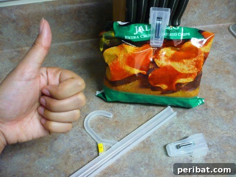 85 Genius Home Organization and Storage Hacks for Every Space 11 Pants hangers repurposed as chip clips