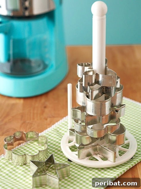 85 Genius Home Organization and Storage Hacks for Every Space 13 Cookie cutters organized on a paper towel rack