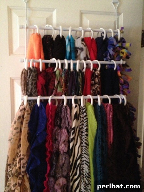 85 Genius Home Organization and Storage Hacks for Every Space 16 Scarves organized with shower curtain rings on a towel bar
