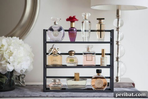 85 Genius Home Organization and Storage Hacks for Every Space 34 Perfume bottles elegantly displayed on a tiered spice rack