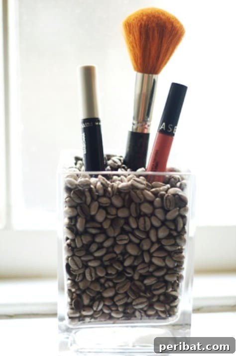 85 Genius Home Organization and Storage Hacks for Every Space 37 Makeup brushes standing upright in a vase filled with coffee beans