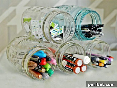 85 Genius Home Organization and Storage Hacks for Every Space 53 Tin cans arranged in a pyramid for storage
