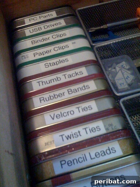 85 Genius Home Organization and Storage Hacks for Every Space 57 Altoids tins stacked and labeled for organizing small office supplies