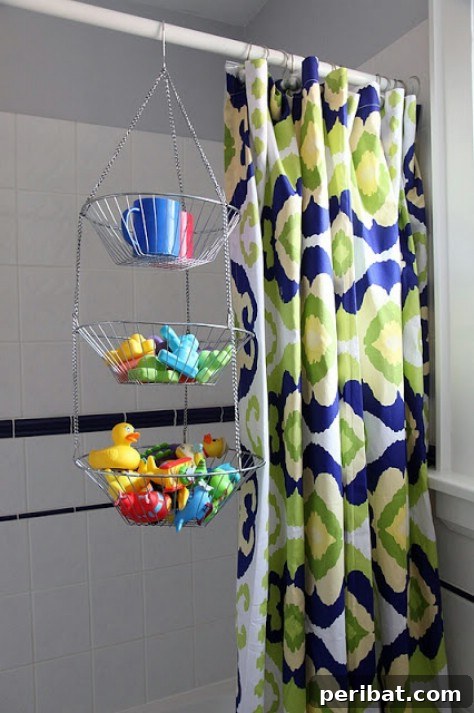85 Genius Home Organization and Storage Hacks for Every Space 80 Bath toys stored in a hanging fruit basket in a shower