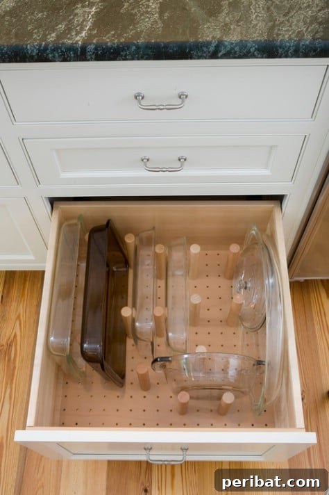 85 Genius Home Organization and Storage Hacks for Every Space 9 Drawer with a pegboard organizer for kitchen utensils