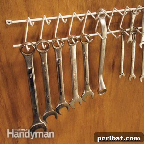 85 Genius Home Organization and Storage Hacks for Every Space 91 Belt rack used to organize and hang wrenches