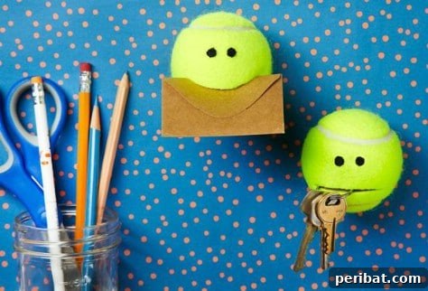 85 Genius Home Organization and Storage Hacks for Every Space 92 Tennis balls with cut 'mouths' and googly eyes, holding keys and notes