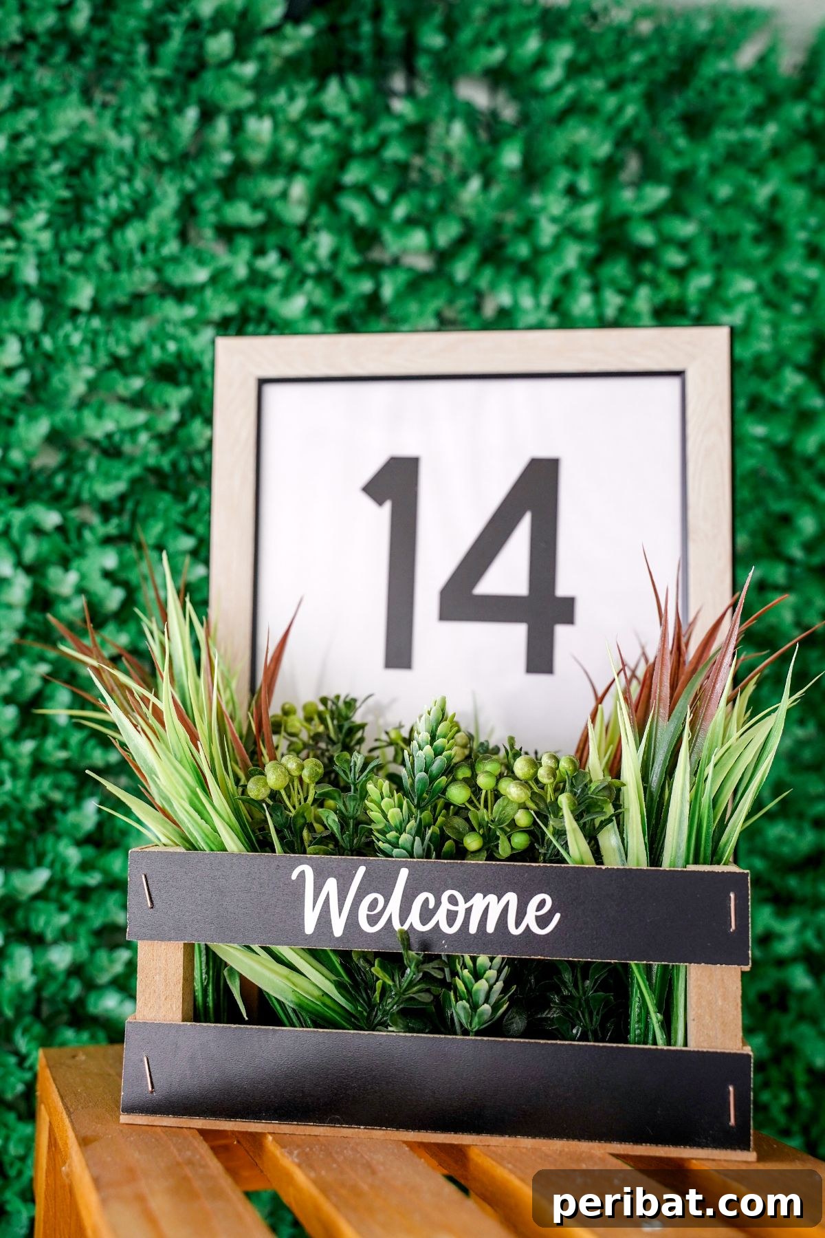 Create Custom Address Signs with Your Cricut 19 house number sign sitting on wood crate in front of shrubs