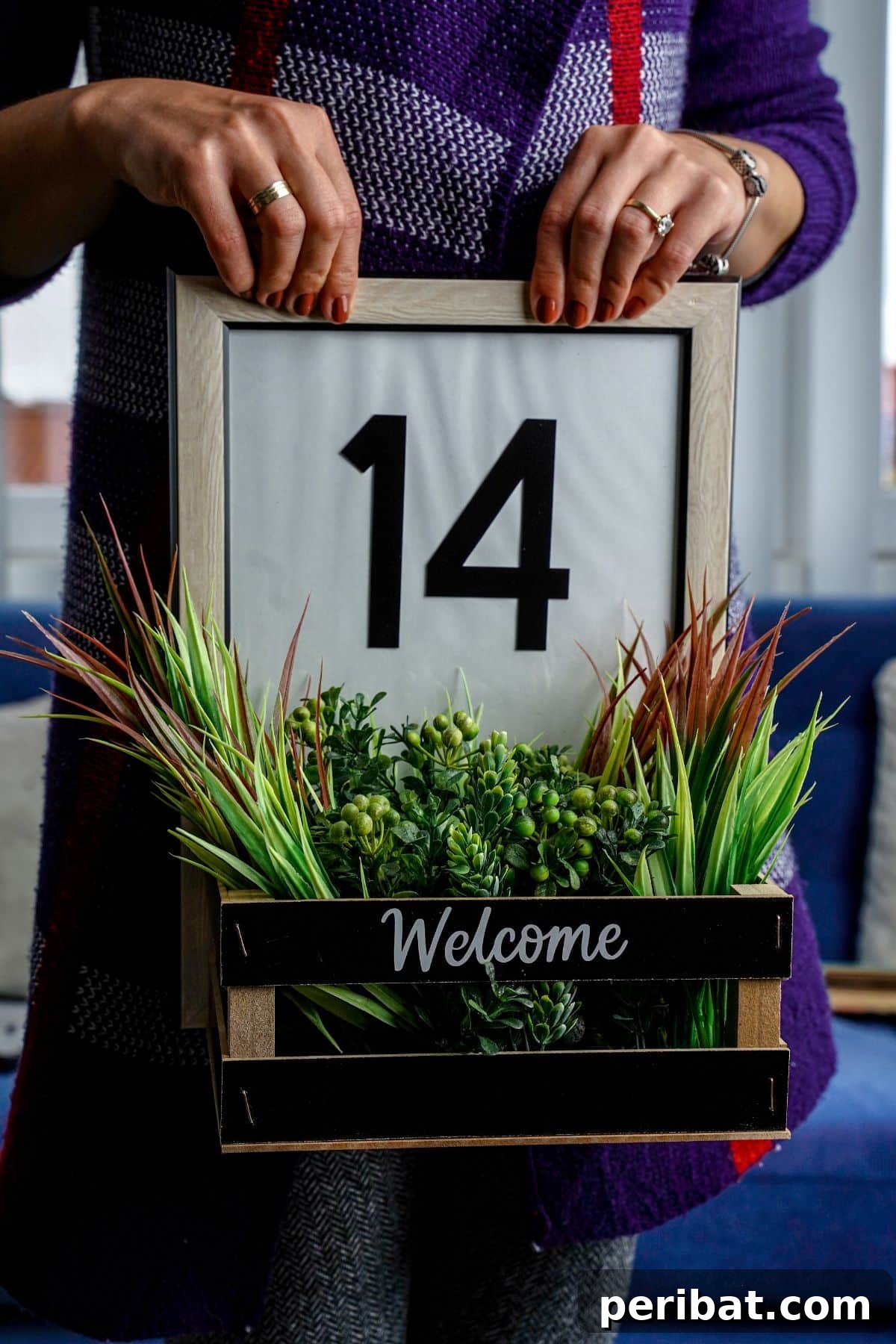 Create Custom Address Signs with Your Cricut 21 woman in purple holding framed house number sign