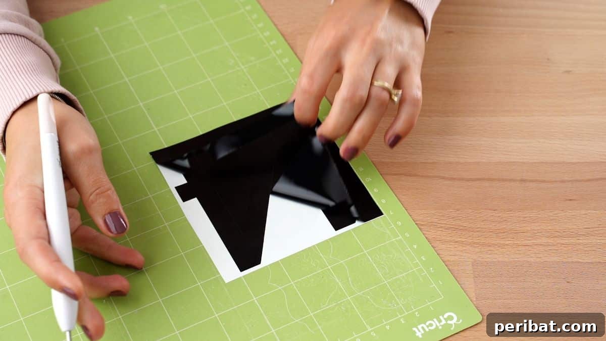 Create Custom Address Signs with Your Cricut 8 peeling excess vinyl off house numbers