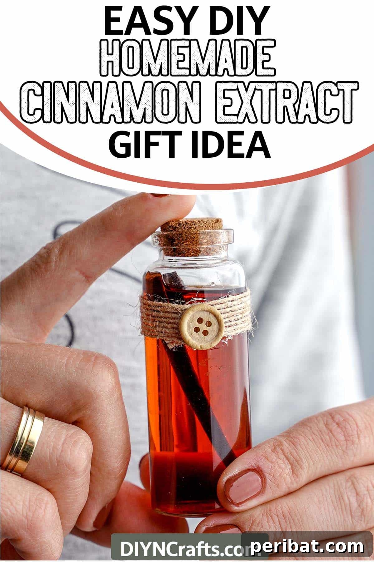 Mastering Homemade Cinnamon Extract 9 A hand holding a decorative bottle of homemade cinnamon extract with text highlighting it as an easy DIY gift idea.
