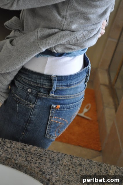 DIY fix for gaping jeans waistband with elastic