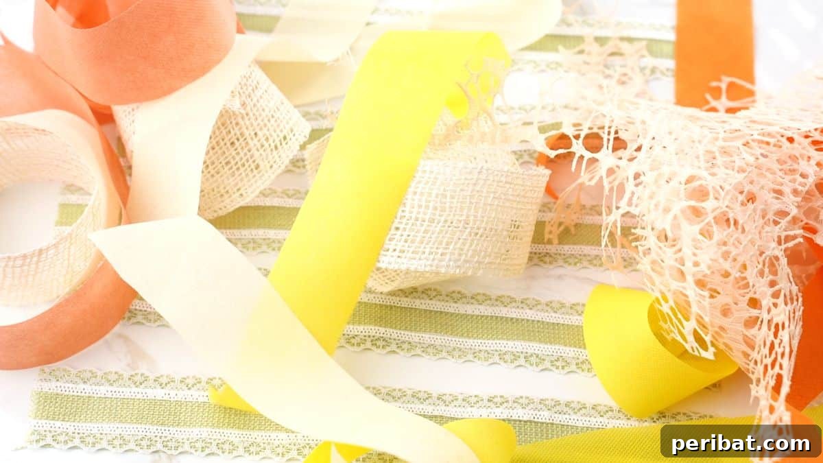 Various strips of twine, burlap lace, and fabric ribbon laid out on a table