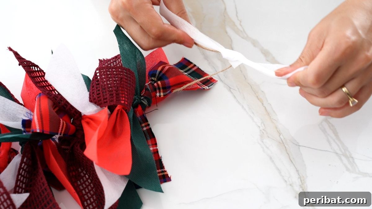 Handcrafted Rustic Christmas Rag Garland 10 hand tying white ribbon onto twine