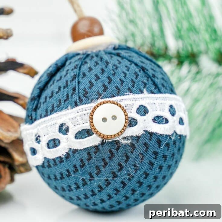 Chic Fabric Holiday Bauble 23 Close-up of a completed fabric ball ornament, showcasing its texture and design, perfect for Pinterest