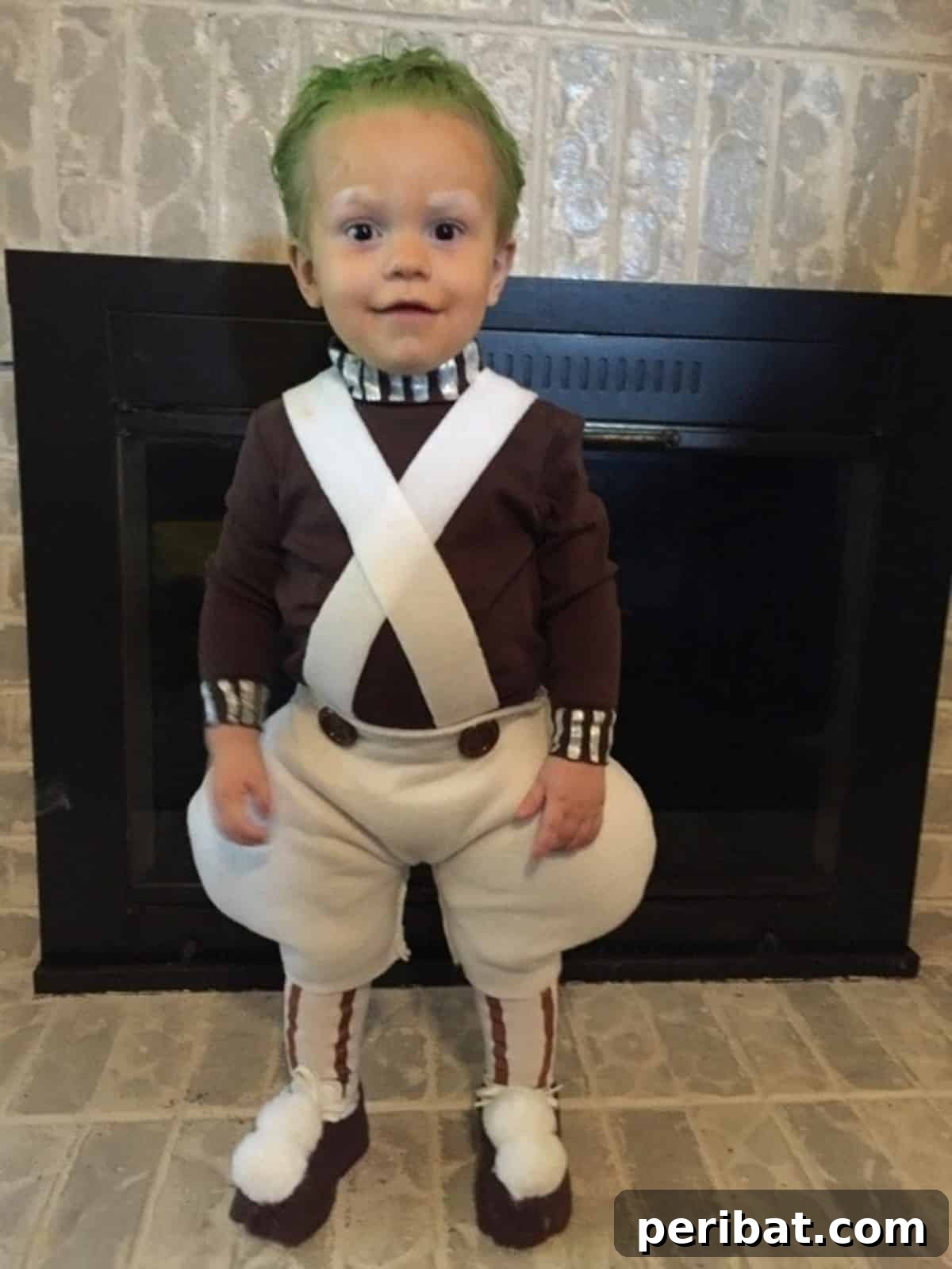 Spooktacularly Adorable DIY Baby Halloween Costume Ideas 8 A fantastic Oompa Loompa baby costume, complete with white overalls, striped shirt, and optionally, temporary green hair. An adorable and instantly recognizable DIY infant outfit.