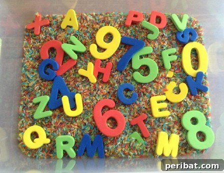 Teach your kids about letters and numbers in a sensory rice bin.