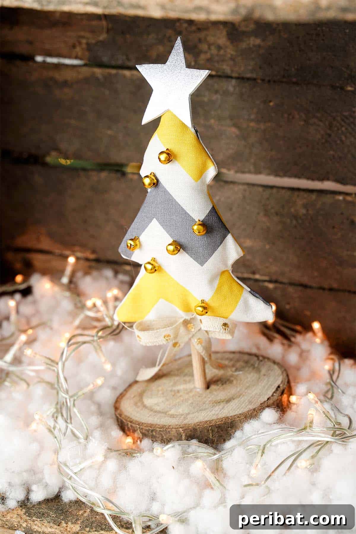 Charming Fabric Tabletop Christmas Tree Craft 3 Two mini fabric Christmas trees on a wooden slab, a charming holiday decoration