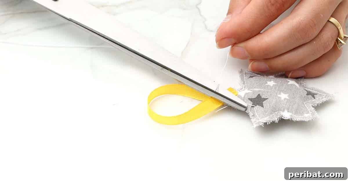 how to add a hanger to a DIY Fabric Star Ornaments