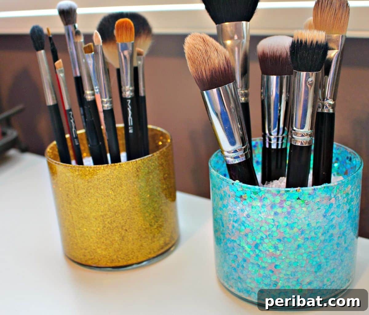 Beyond the Wick: Creative Candle Jar Transformations 11 Two glitter containers from candle jars.