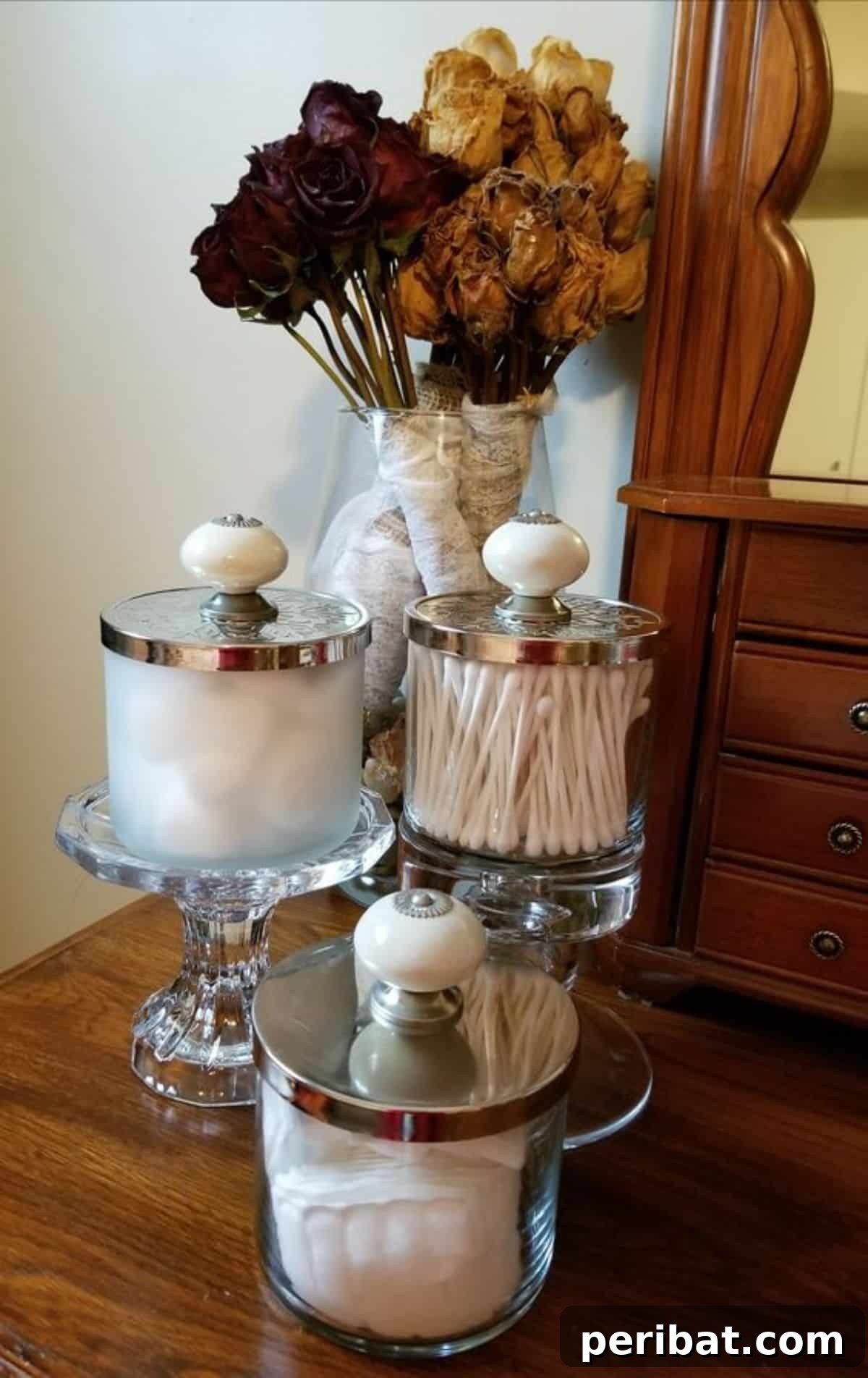 Beyond the Wick: Creative Candle Jar Transformations 20 Cotton Swab and Wipes Candle Jars made from old candle jars.