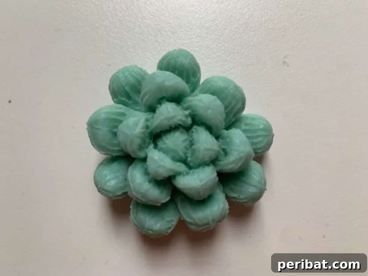 Beyond the Wick: Creative Candle Jar Transformations 4 A succulent wax candle.