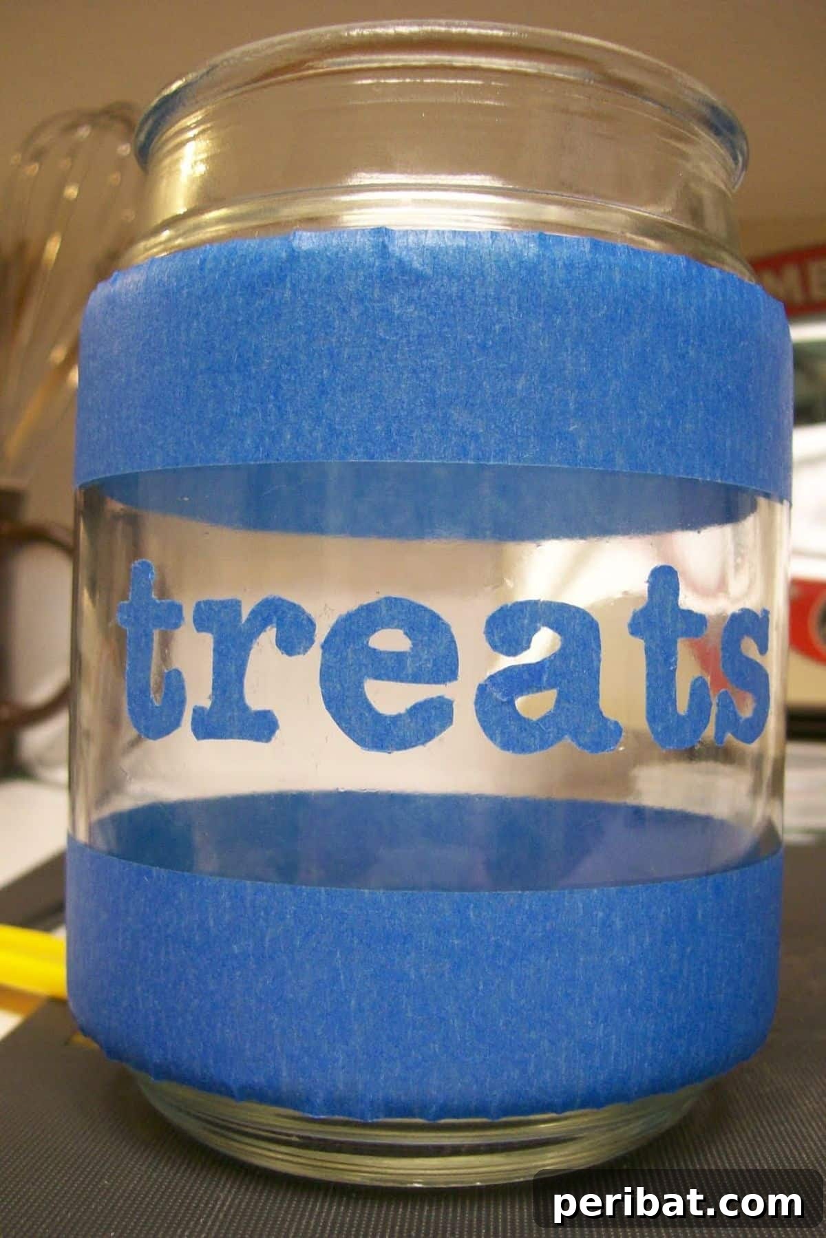 Beyond the Wick: Creative Candle Jar Transformations 9 A repurposed candle jar as a treat jar,