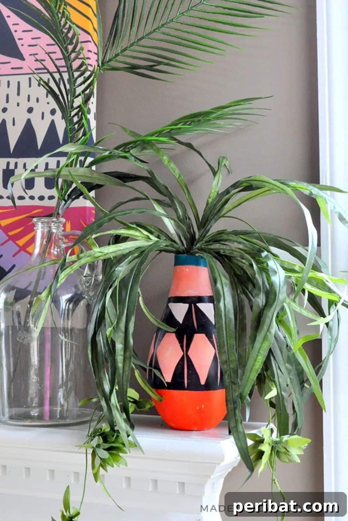 120 Inspiring DIY Boho Decor Ideas and Projects 12 Modern and trendy DIY painted tribal vases from thrift store finds, adding unique character to any space.