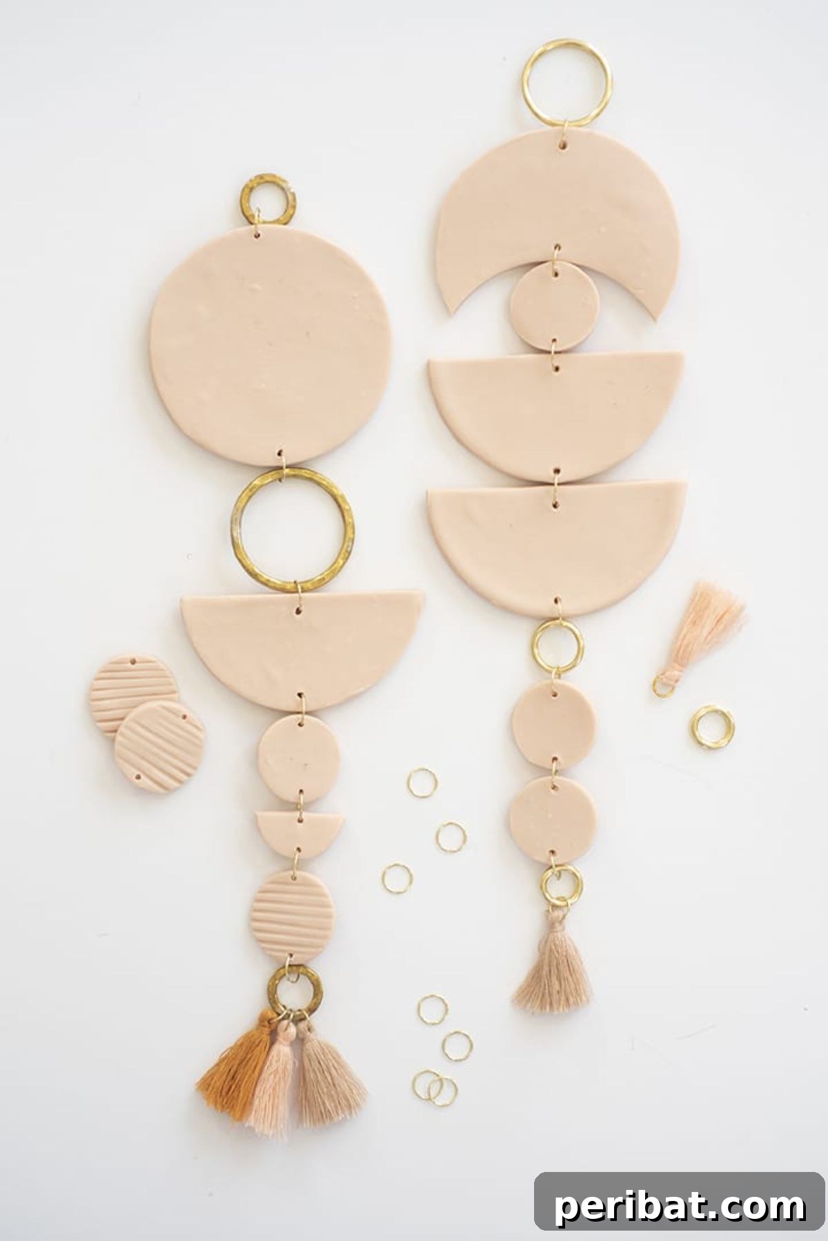 120 Inspiring DIY Boho Decor Ideas and Projects 114 Aesthetic DIY clay wall hanging, using oven-bake clay and simple jewelry pieces to create understated elegance in any room.