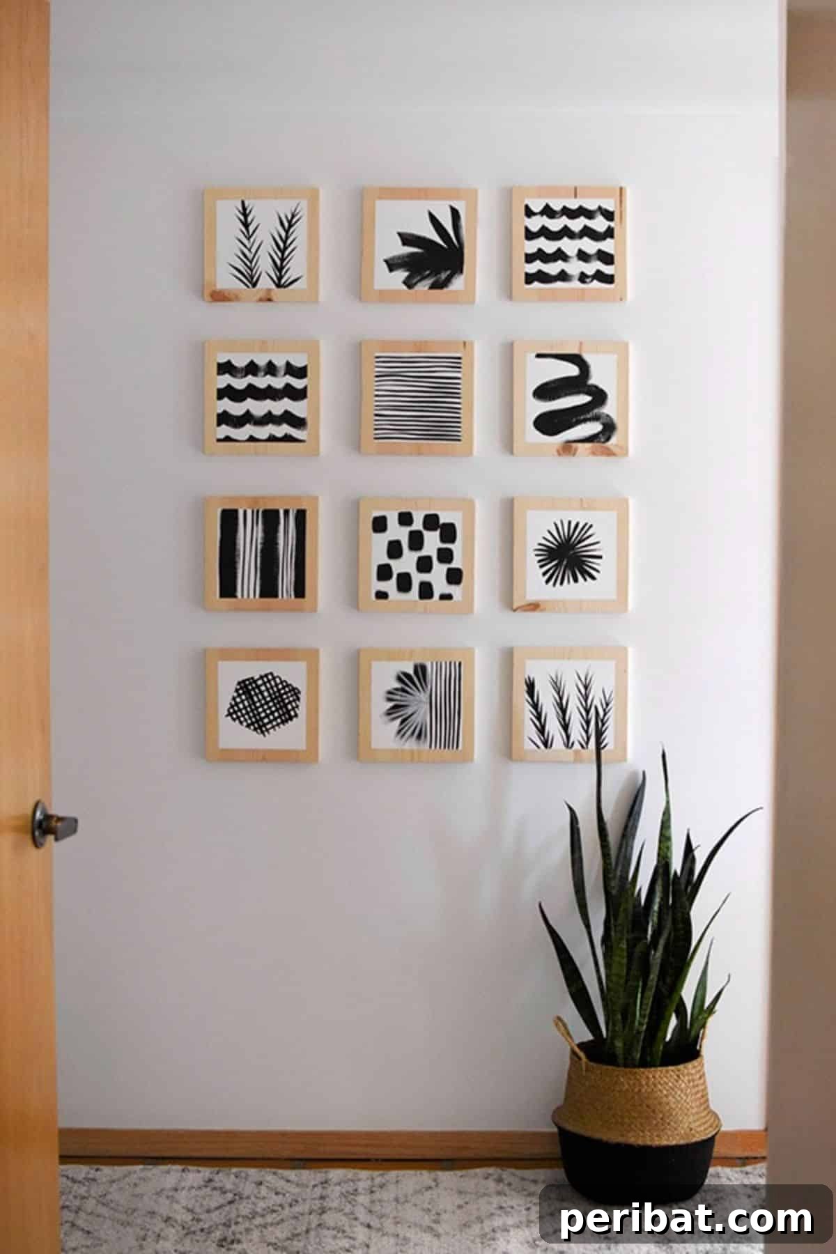 120 Inspiring DIY Boho Decor Ideas and Projects 118 Vibrant artistic hallway gallery wall art with wooden blocks and contrasting patterns, creating a captivating atmosphere that will impress guests.