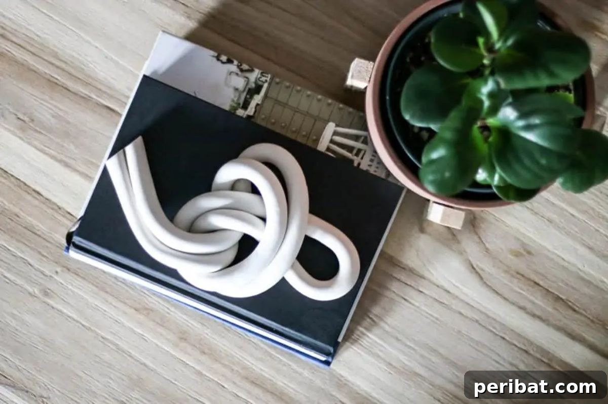 120 Inspiring DIY Boho Decor Ideas and Projects 119 Chic easy DIY clay knot made with polymer clay, offering a modern boho aesthetic akin to high-end retail designs.