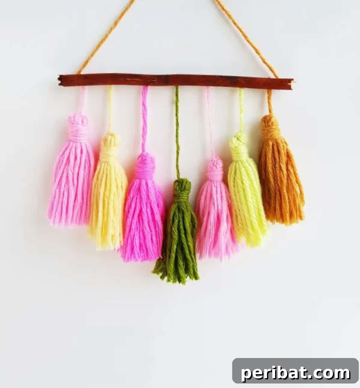 120 Inspiring DIY Boho Decor Ideas and Projects 125 Elegant DIY boho tassel wall hanging, transforming simple yarn into a statement piece for your home.