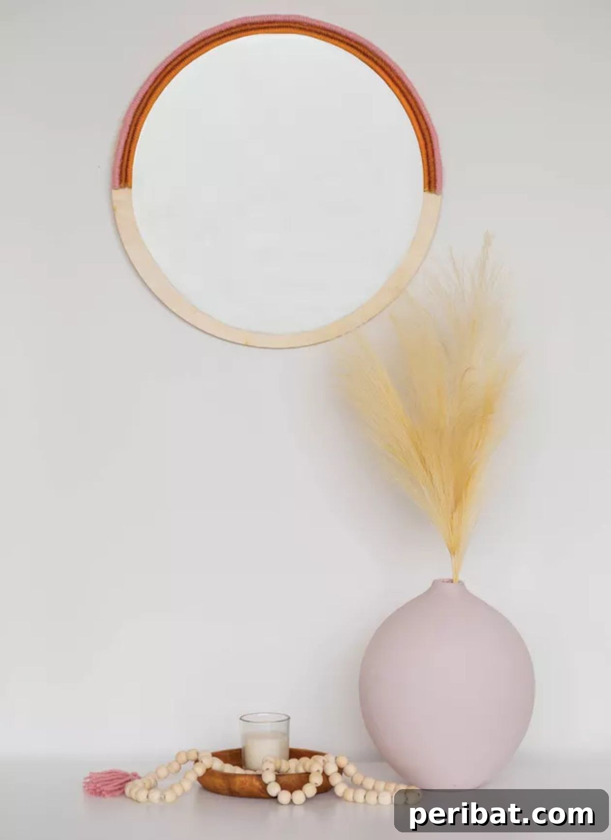 120 Inspiring DIY Boho Decor Ideas and Projects 14 Statement DIY boho mirror combining rustic wood and warm yarn for an earthy, luxurious finish.