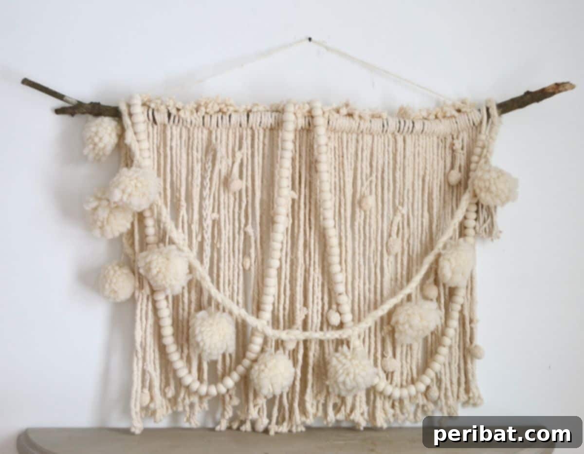 120 Inspiring DIY Boho Decor Ideas and Projects 21 Repurposed thrifted mop transformed into a chic DIY wall hanging with yarn and pom-poms.