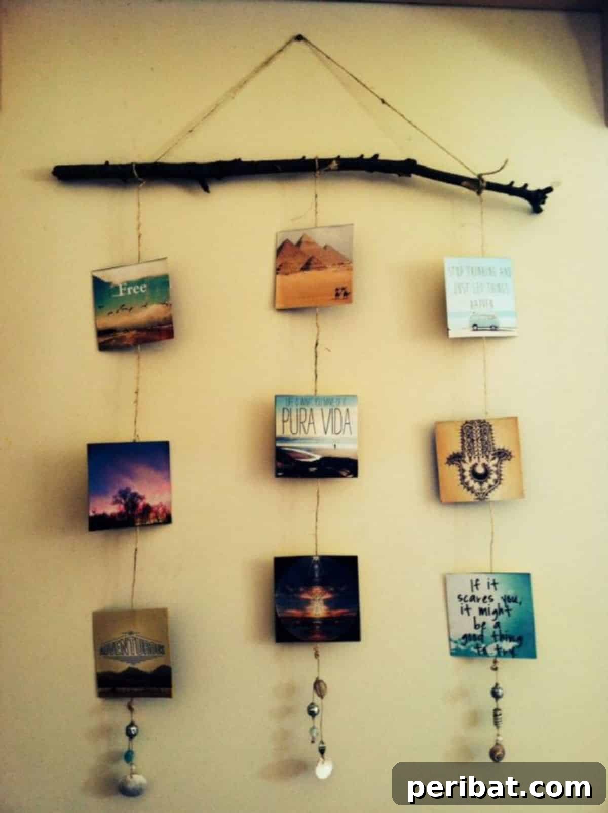120 Inspiring DIY Boho Decor Ideas and Projects 27 Artistic photo branch display, transforming cherished photos into unique hanging decor and a fun family craft.